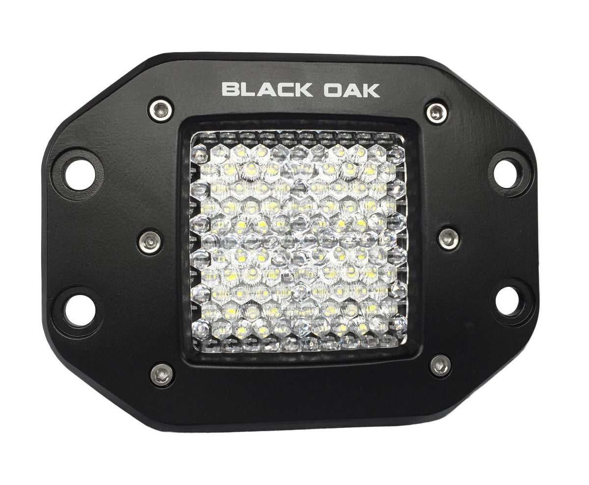 A Black Oak LED Pro Series 2.0 flush mount pod light installed in a body panel, the flush mount pod design this article covers.