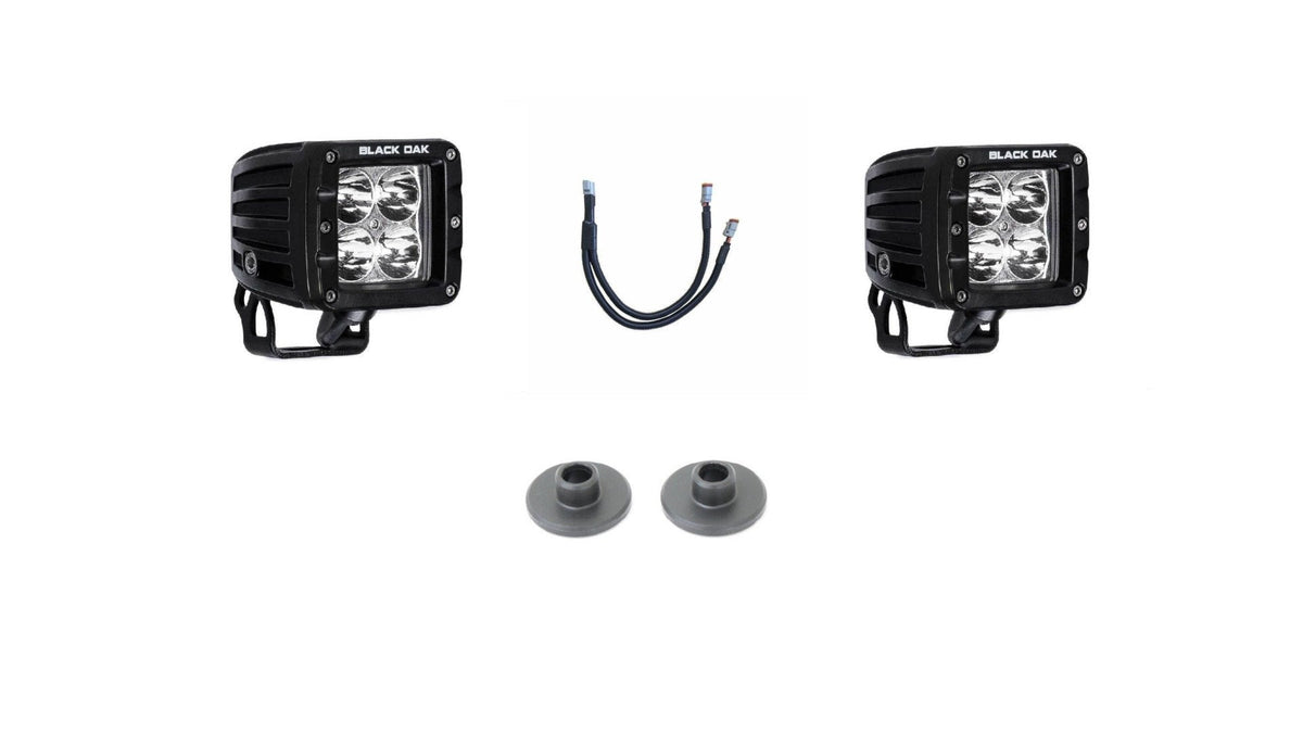 Black Oak LED pod lights mounted on a Ford Bronco, auxiliary scene lighting mounted for an adventure rig.