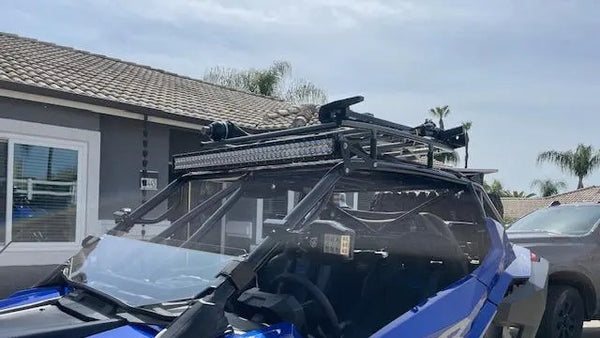 A Black Oak LED light bar mounted on a vehicle, illustrating the mounting locations compared here.