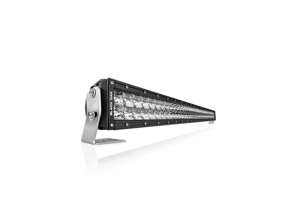A 40-inch double row light bar fitted behind the grille of a Ford F-150 Raptor, a Ford truck fitment of the kind covered here.