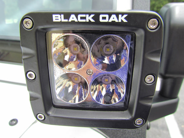 A Black Oak LED Pro Series pod light close up, the pod light format this buying guide helps you choose.